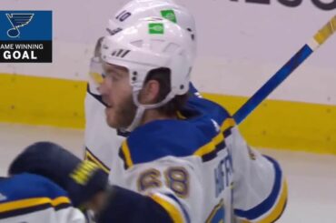 Une minuterie.  Pas de question.  C'est un gagnant OT pour Mike Hoffman ...